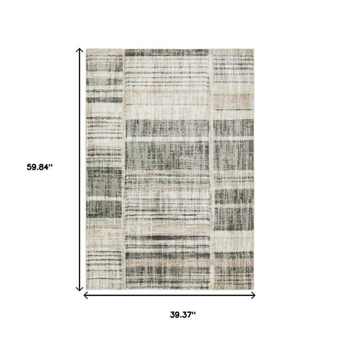 3' X 5' Grey Charcoal Ivory Tan Brown And Beige Geometric Power Loom Stain Resistant Area Rug